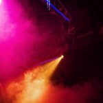 purple and orange light on a concert